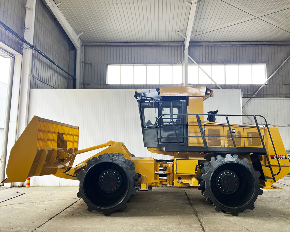 Side view of the waste compactor